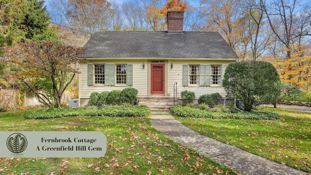 view of front of home featuring a front lawn