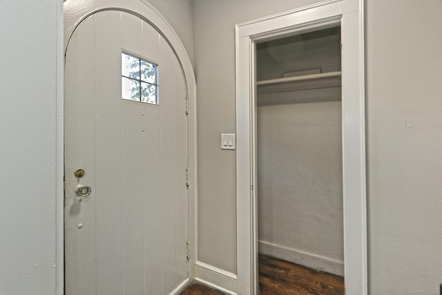 interior space with dark hardwood / wood-style flooring