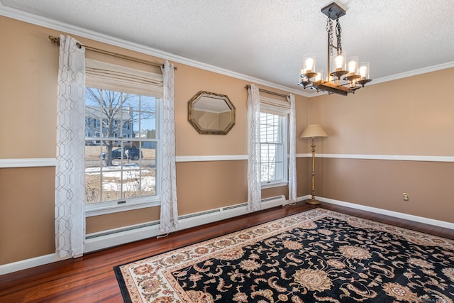 16 Snow Rdg S, Middletown, CT 06457 - unfurnished dining area with wood finished floors, baseboards, baseboard heating, a textured ceiling, and a chandelier