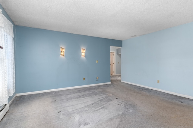 16 Snow Rdg S, Middletown, CT 06457 - carpeted empty room featuring baseboards, a baseboard heating unit, and a textured ceiling