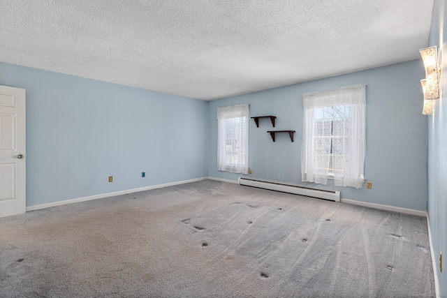16 Snow Rdg S, Middletown, CT 06457 - carpeted spare room featuring baseboards, a baseboard radiator, and a textured ceiling
