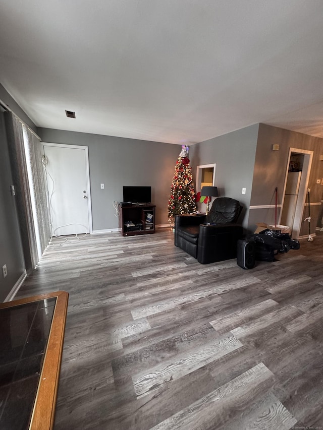 living room with hardwood / wood-style flooring