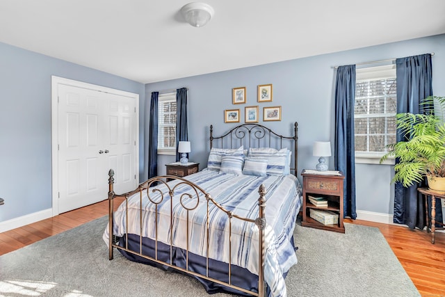 bedroom featuring a closet and hardwood / wood-style floors