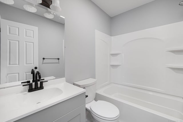 full bathroom featuring vanity, toilet, and shower / tub combination