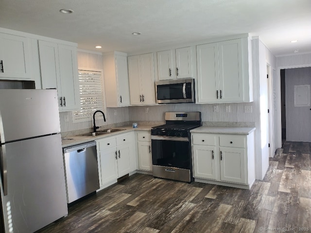 270 Boston Post Rd Unit 22, Waterford, CT 06385 - kitchen with dark hardwood / wood-style flooring, stainless steel appliances, white cabinetry, and sink