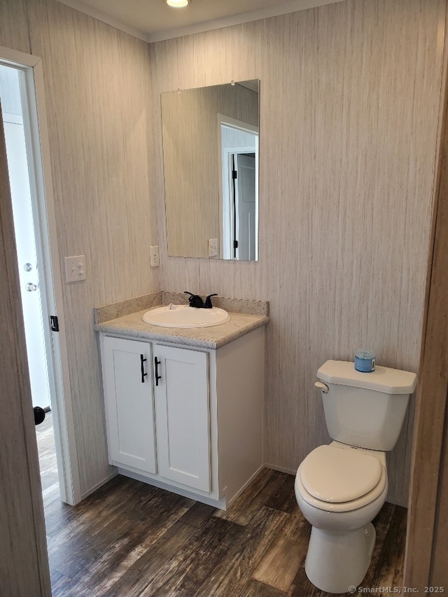 270 Boston Post Rd Unit 22, Waterford, CT 06385 - bathroom with hardwood / wood-style floors, vanity, and toilet