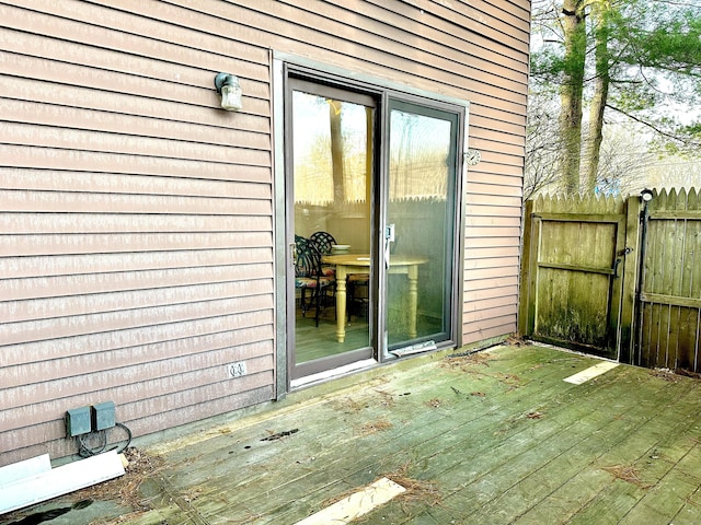 entrance to property with a wooden deck