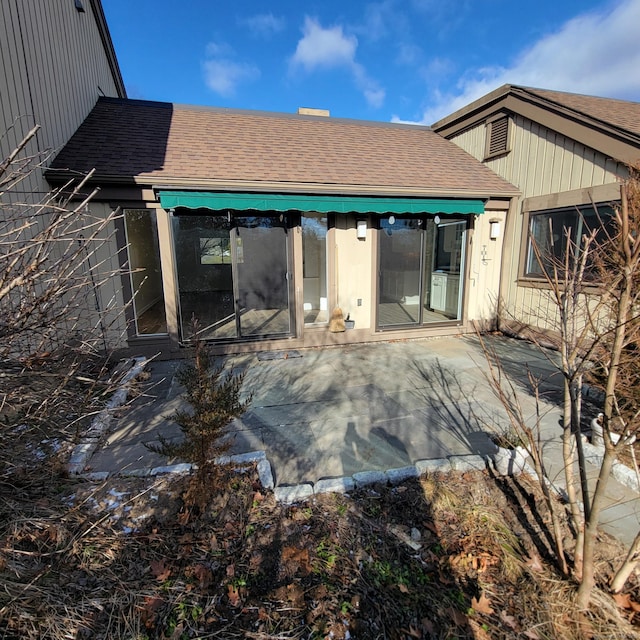 rear view of house with a patio area