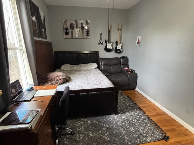 bedroom featuring hardwood / wood-style floors