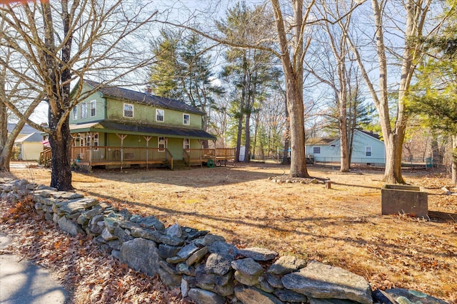 view of yard with a deck