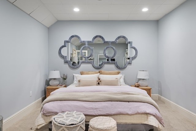 carpeted bedroom featuring vaulted ceiling