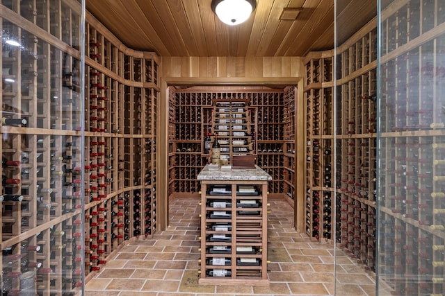 wine area with wood ceiling