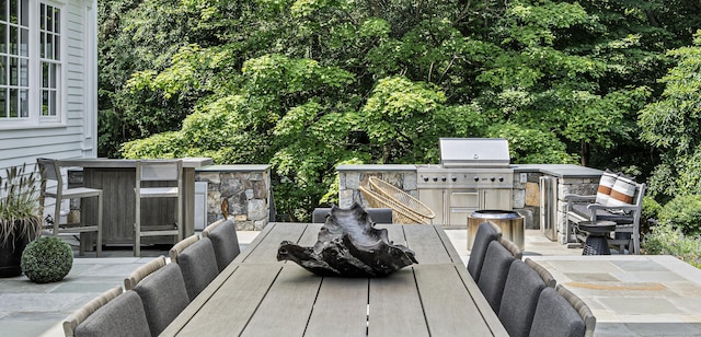 view of patio featuring area for grilling and grilling area