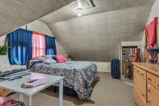 bedroom with light colored carpet and vaulted ceiling