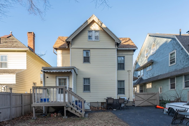 back of house with a patio