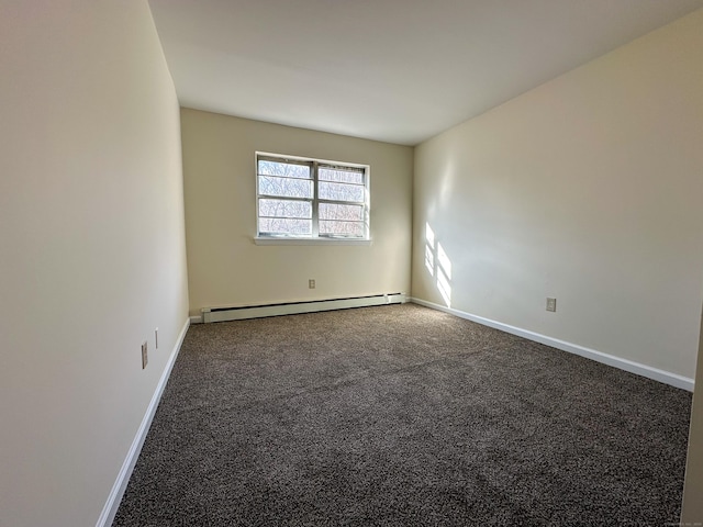 empty room with carpet floors and a baseboard radiator