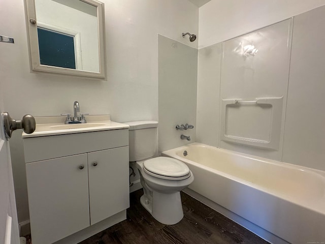 full bathroom featuring hardwood / wood-style floors, vanity,  shower combination, and toilet