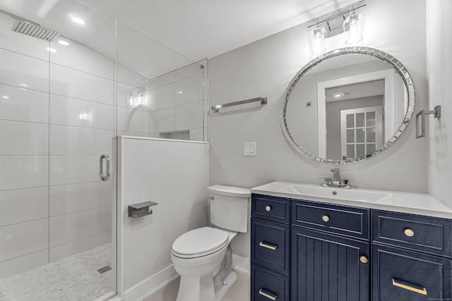 full bathroom with toilet, a stall shower, visible vents, and vanity