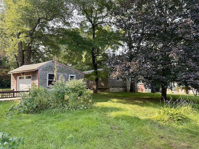 view of yard with a garage