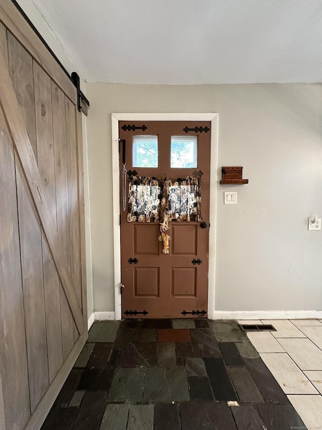 interior space with a barn door