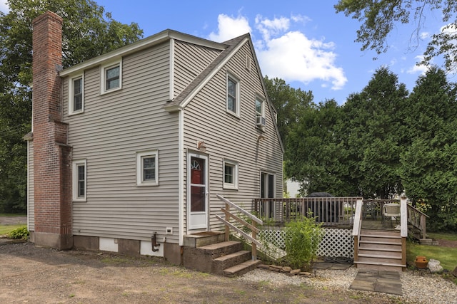 rear view of house with a deck