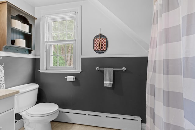 bathroom with vanity, a baseboard radiator, and toilet