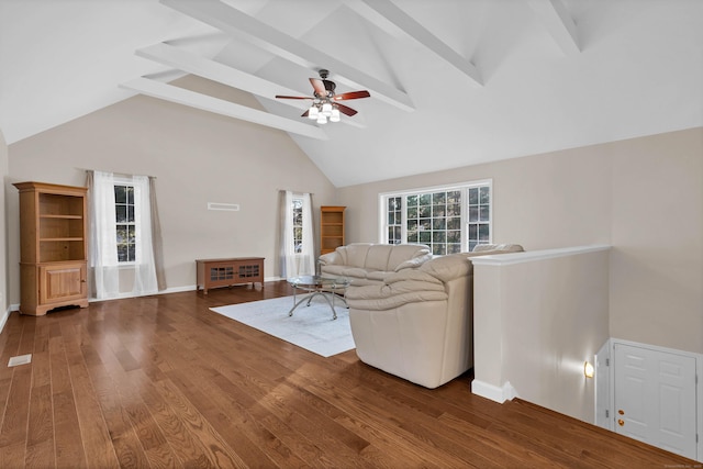 living room featuring beamed ceiling, ceiling fan, wood-type flooring, and high vaulted ceiling