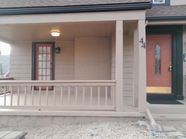 doorway to property with a porch