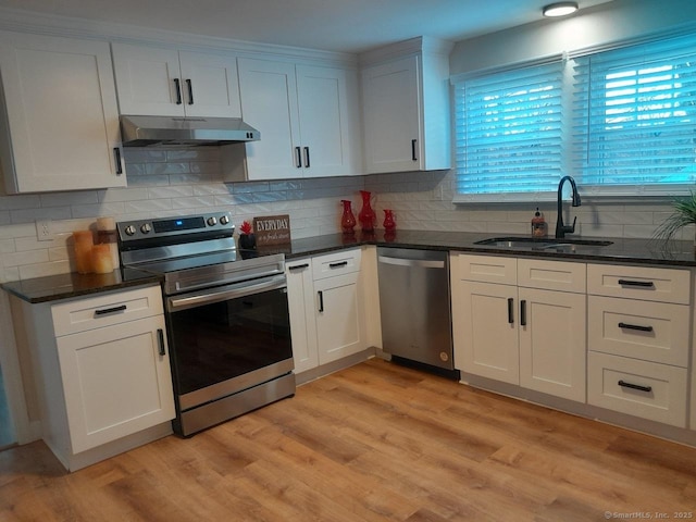 kitchen featuring light hardwood / wood-style flooring, stainless steel appliances, white cabinetry, and sink