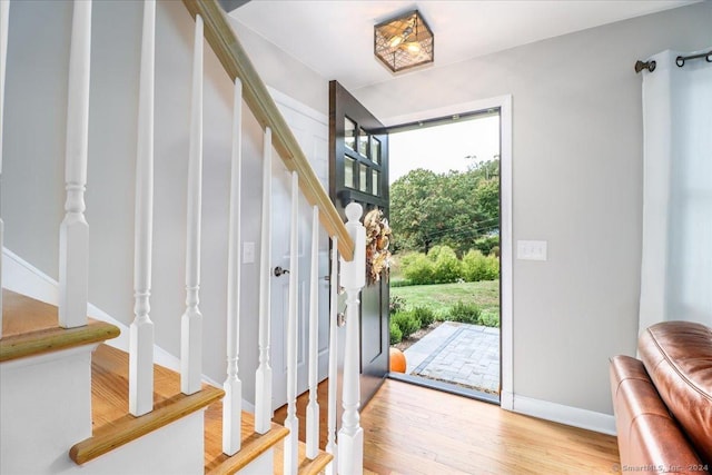 entryway with light hardwood / wood-style flooring