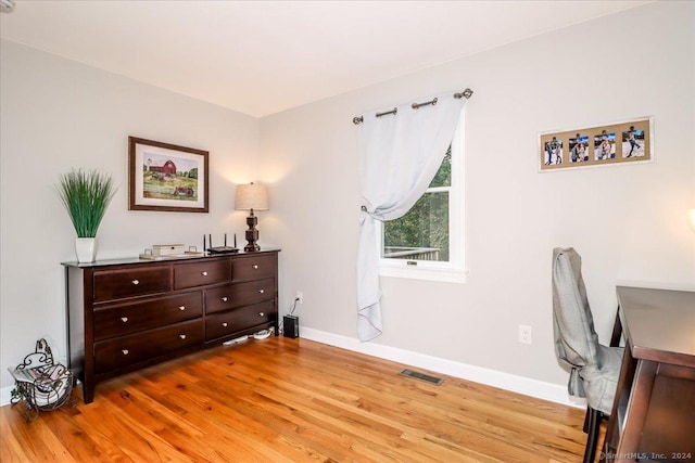 bedroom with light hardwood / wood-style flooring