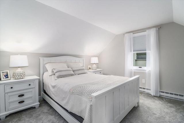 carpeted bedroom with lofted ceiling and baseboard heating