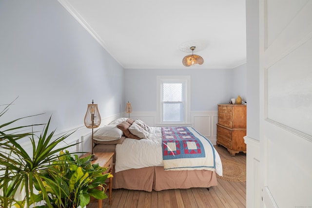 bedroom featuring crown molding