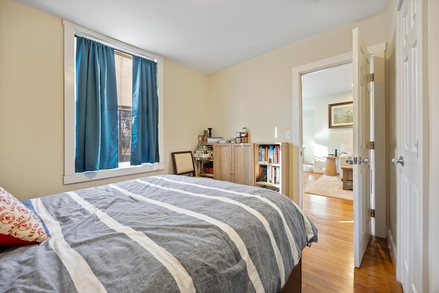 bedroom featuring hardwood / wood-style floors