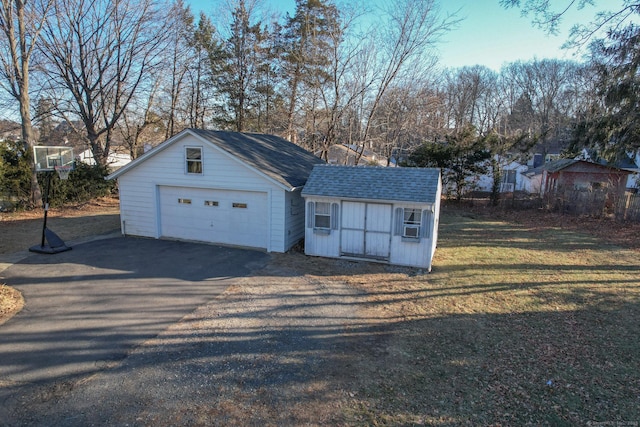 garage with a lawn