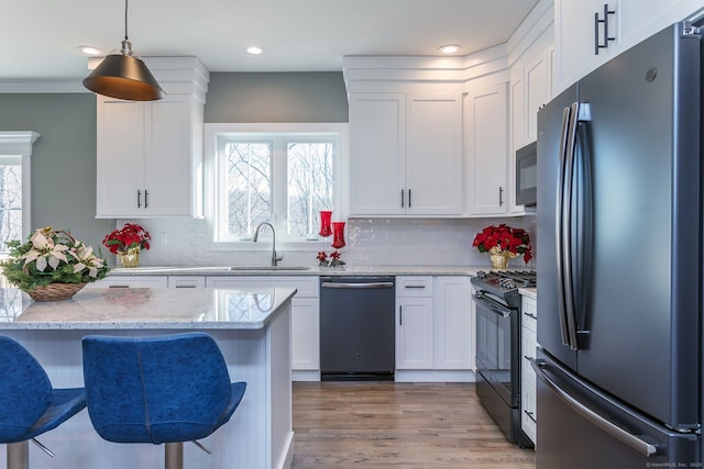LOT7 Deerwood Rd, Oxford, CT 06478 - kitchen featuring black appliances, a sink, white cabinets, and recessed lighting