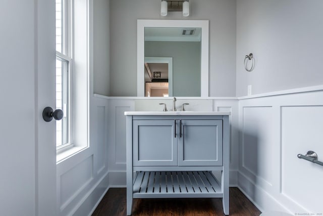 LOT7 Deerwood Rd, Oxford, CT 06478 - bathroom featuring a decorative wall, wainscoting, vanity, and wood finished floors