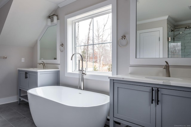 LOT7 Deerwood Rd, Oxford, CT 06478 - bathroom with two vanities, a freestanding bath, baseboards, marble finish flooring, and crown molding