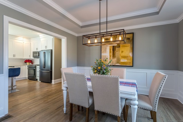 LOT7 Deerwood Rd, Oxford, CT 06478 - dining area featuring wood finished floors, wainscoting, crown molding, a decorative wall, and a tray ceiling