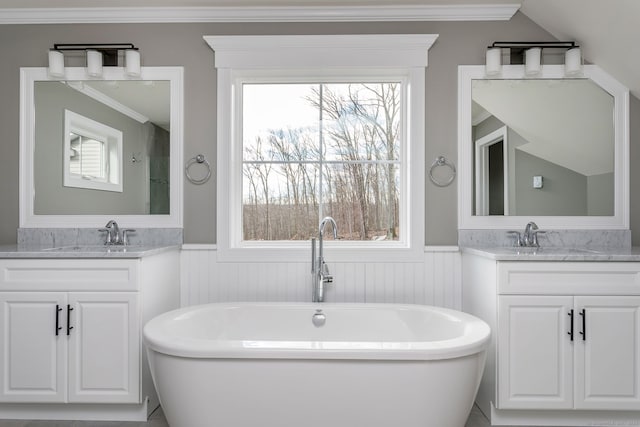 LOT7 Deerwood Rd, Oxford, CT 06478 - bathroom featuring wainscoting, a freestanding tub, two vanities, and ornamental molding
