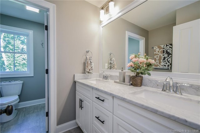 LOT7 Deerwood Rd, Oxford, CT 06478 - full bath with toilet, double vanity, and baseboards