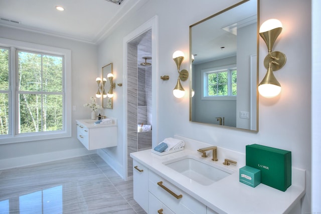 bathroom featuring tile patterned flooring and vanity