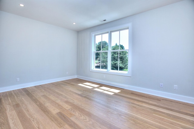 empty room with light wood-type flooring