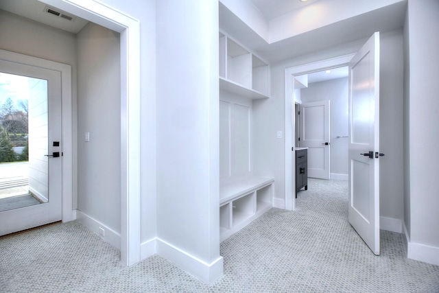 mudroom with light tile patterned flooring