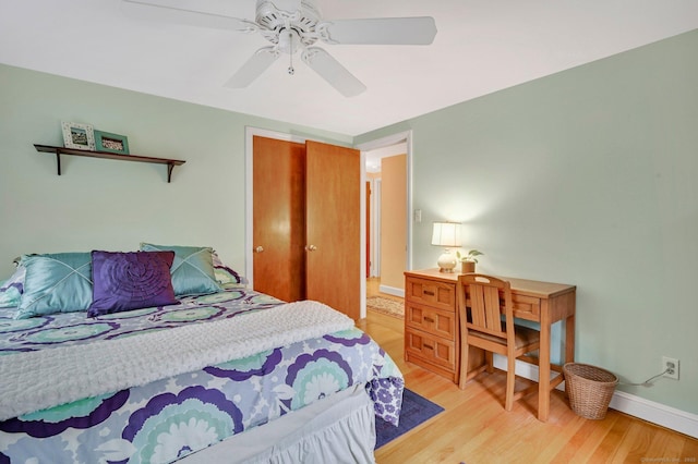 bedroom featuring ceiling fan and light wood-type flooring