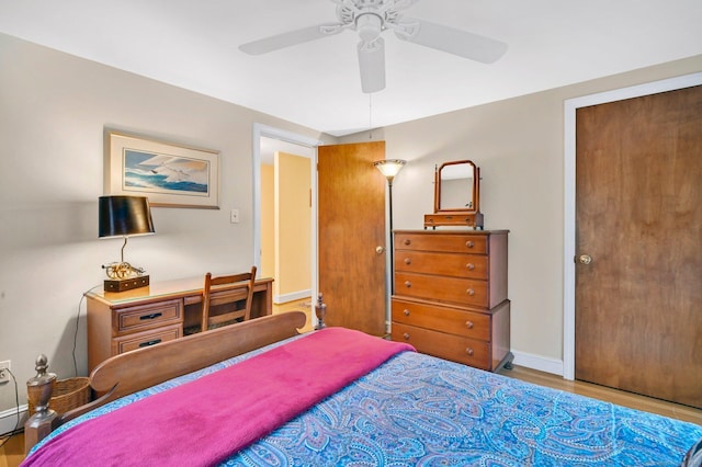 bedroom featuring ceiling fan and light wood-type flooring