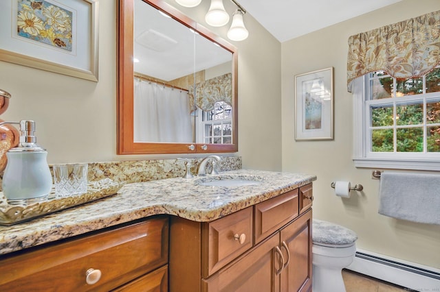 bathroom featuring a shower with shower curtain, vanity, toilet, and a baseboard heating unit