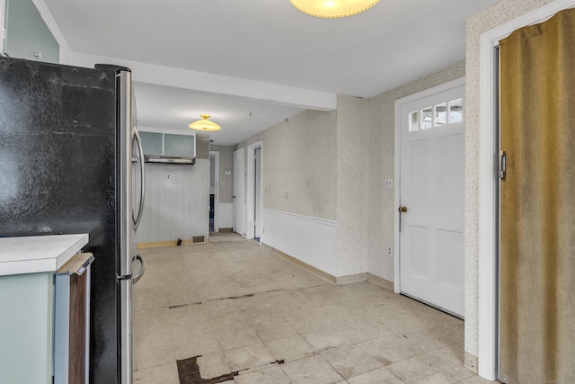 kitchen featuring stainless steel fridge