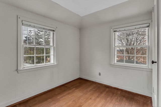 empty room featuring hardwood / wood-style flooring