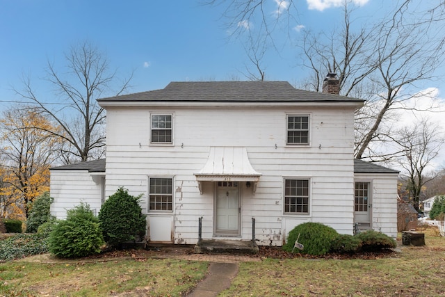 exterior space featuring a front yard